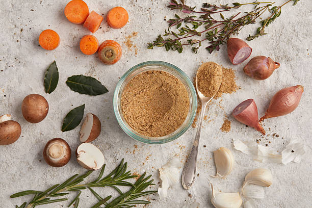 Dry homemade vegetable broth powder in a glass jar, perfect for soups, stews, or seasoning. Plant-based and additive-free.