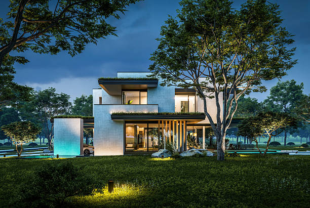 istock 3d rendering of two-story house with concrete facade in night 2220376873