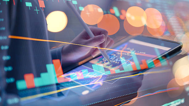 istock Digital investor tablet user analyzing fluctuating stock charts with ai predictive tools and fintech data overlay trading concept with ai algorithm in financial market 2220378552