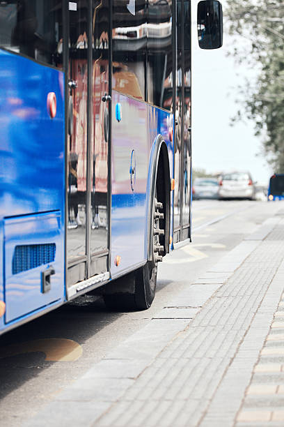 istock Blue bus for public transportation on city streets. 2220388563