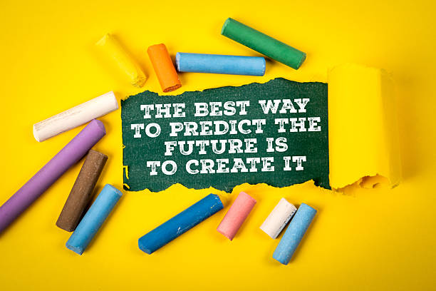 istock Inspirational Quote About Creating the Future Surrounded by Colorful Chalk on Yellow Background 2220391171