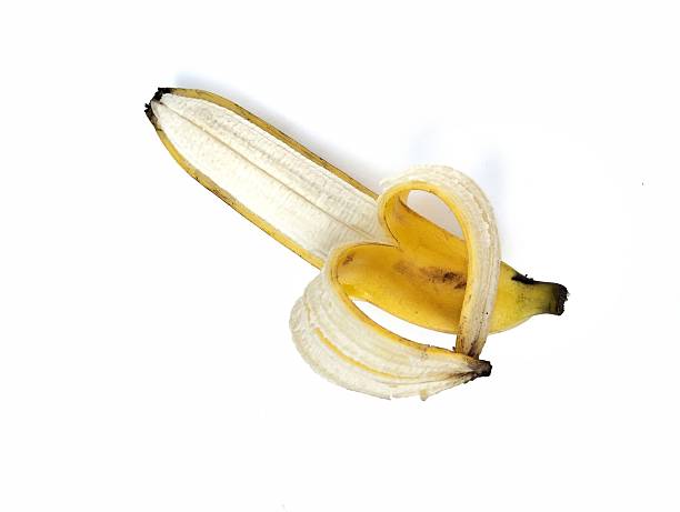 Fresh banana peeled isolated on white background. Healthy food concept