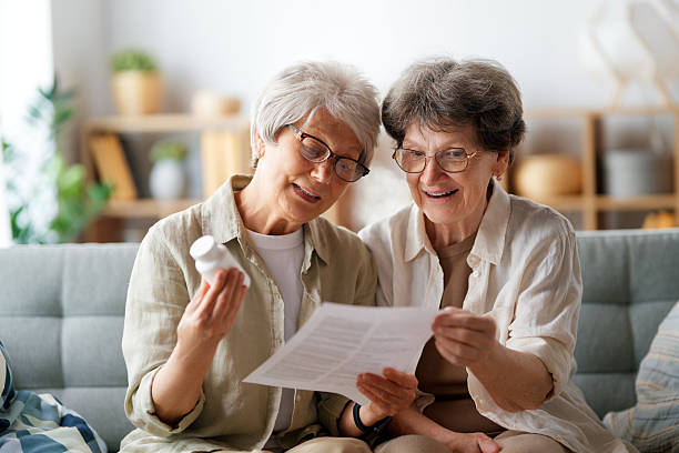 istock women are taking medication at home 2220394256