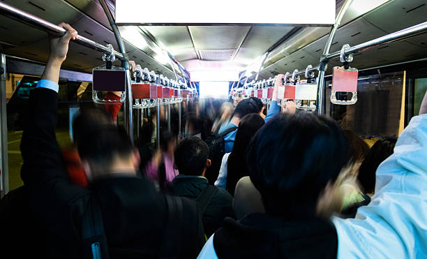 istock Crowd of people in the bus 2220394415