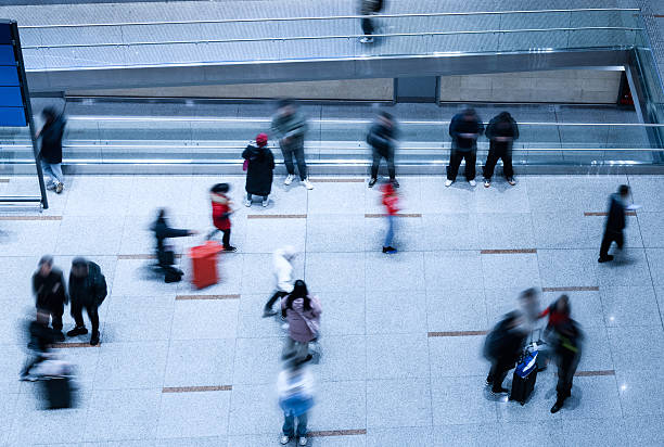 istock High angle view of people in airport 2220394459