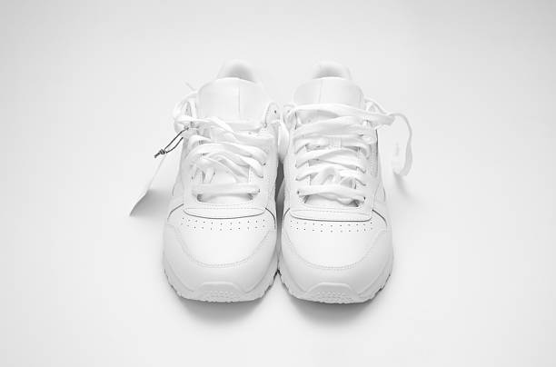 istock New white sneakers on a white background. 2220397160