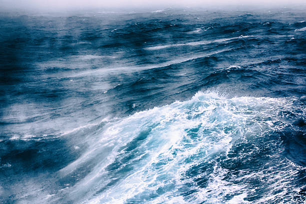 istock turbulent waves of Pacific ocean 2220399297