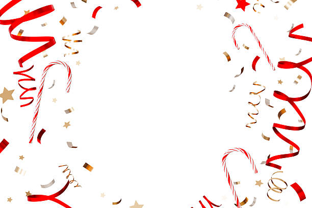 istock Colorful candy canes and sparkling confetti isolated on white background, creating a vibrant Christmas atmosphere perfect for holiday festivities and joyful gatherings. Copy space in the middle. 2220405716