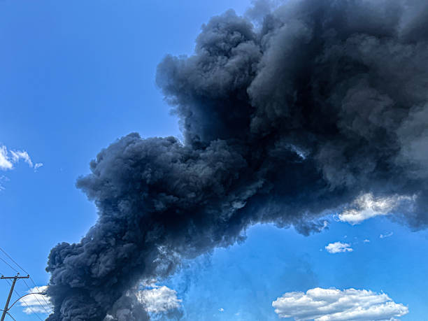 istock Black smoke from tire burning 2220406742