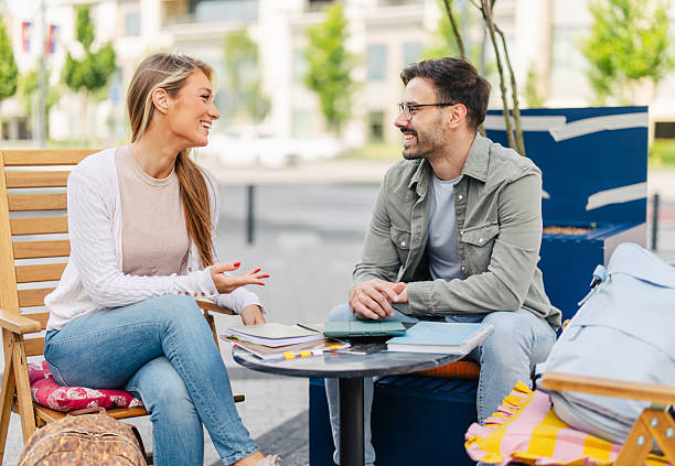 istock Young Couple Enjoying Conversation Outdoors Together 2220412410