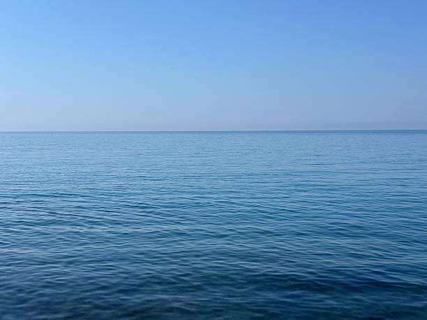 istock Blue calm sea and clear sky horizon. 2220423126