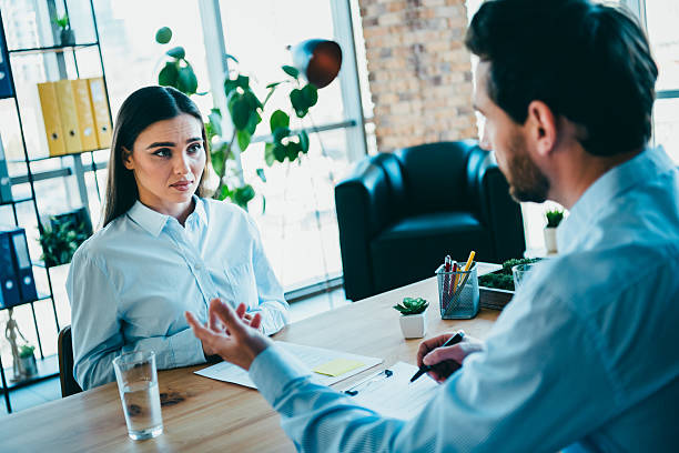 istock Professional workplace meeting between colleagues discussing project goals and strategies in a modern office environment 2220423936