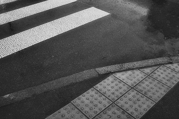 istock Urban Crosswalk on a Rainy Day 2220425733