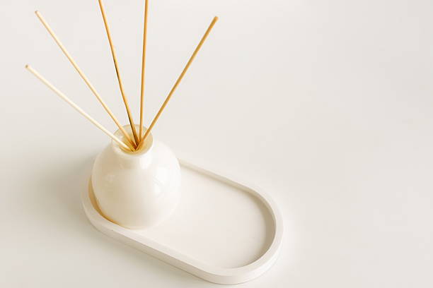 istock Home fragrance diffuser on white table background isolated top view with copy space, 2220428314