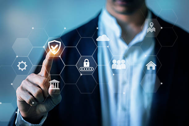 istock A businessperson interacting with holographic icons for secure communication and data management. 2220429529