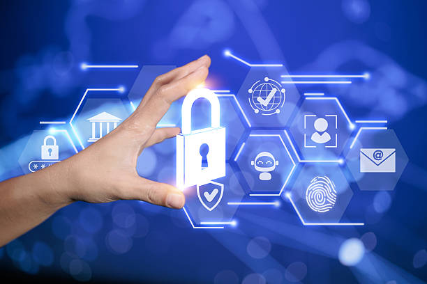 istock A hand holding a glowing lock icon surrounded by icons for biometrics, encryption, and other secure systems, highlighting modern digital safety mechanisms. 2220429782