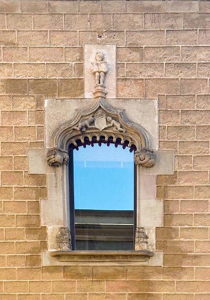 istock Casa de l'Ardiaca artfully framed window in Barcelona, Spain 2220431705