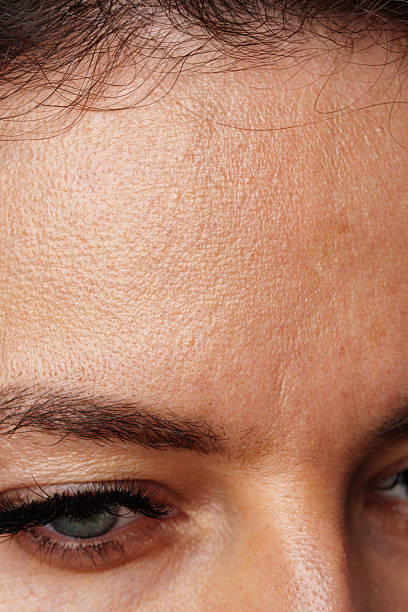 istock Close-up view of a woman's striking blue eyes with long lashes 2220432994