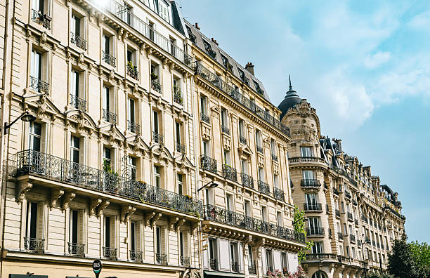 istock Elegant Historical Parisian Buildings Under a Bright Blue Sky 2220433780