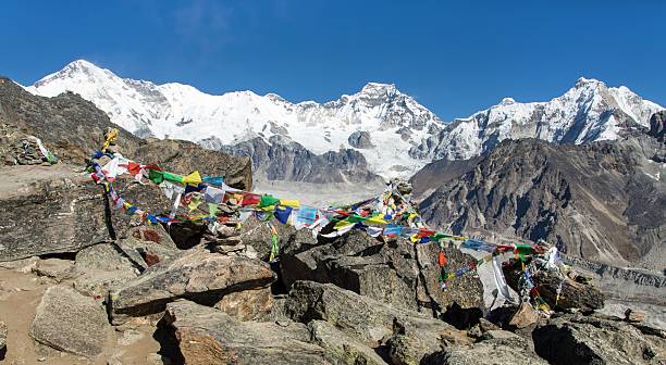 istock Mount Cho Oyu Gokyo Ri peak buddhist prayer flags 2220436163