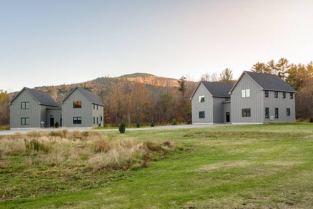 istock Housing development in a mountain setting at sunset in autumn 2220437433