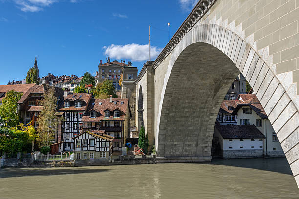 Arch of Nydeggbruckebridge bridge on Aare River to Old City of Bern in Switzerland.