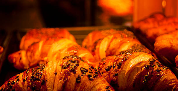 Fresh baked croissants on tray.