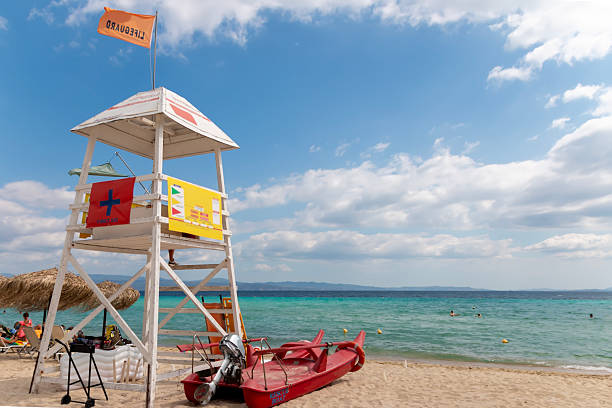 istock Lifeguard tower on the beach. Cloudscape over the sea. 2220442982