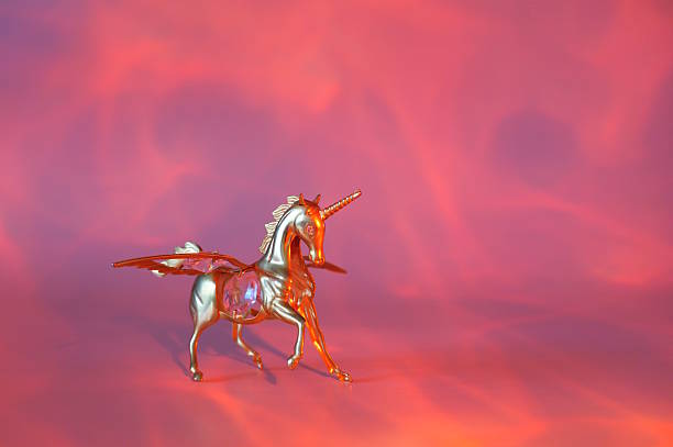 A unicorn figurine on a red background.