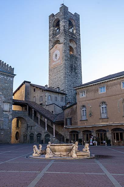 istock Historic Clock Tower and Fountain in Piazza Vecchia, Bergamo 2220446038