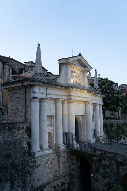 istock Illuminated Porta San Giacomo at Dusk 2220446094