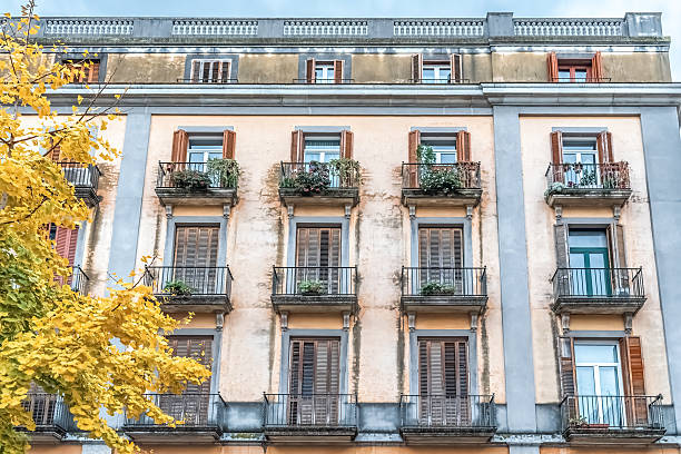 Close up of the buildings surrounding Plaza de la Constitución or Constitution Square in the old town of Donostia / San Sebastián. The building was constructed in 1817, and the numbers above the windows mark the bullring boxes from the time when the square was used as a bullring.