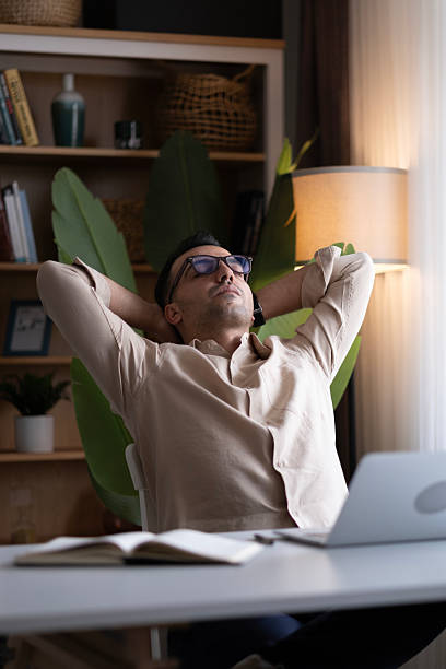 istock Thoughtful businessman think of online project looking at laptop 2220453714