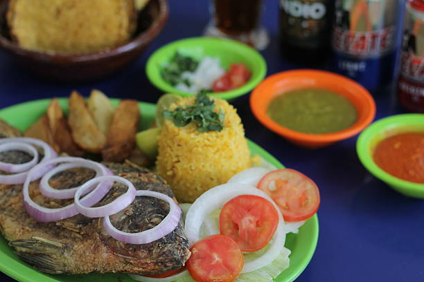 istock A beautifully presented grilled fish dish accompanied by rice and fresh vegetables, showcasing a healthy and colorful meal that appeals to seafood lovers everywhere. 2220454269