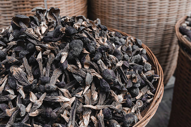 istock Dried mushrooms in bamboo basket 2220457379