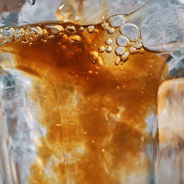 istock Preparing Iced Coffee Americano Served in a Glass 2220460601