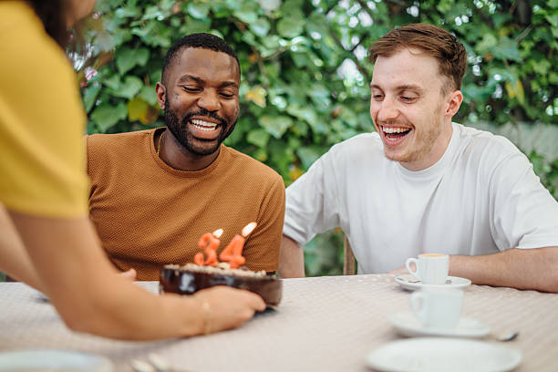 istock Friends eating lunch at a restaurant 2220464300
