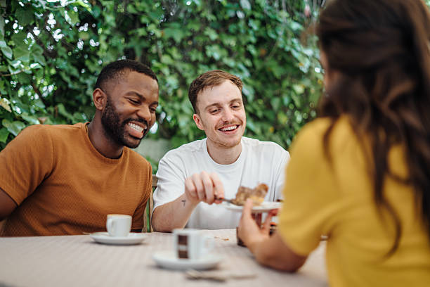istock Friends eating lunch at a restaurant 2220464328