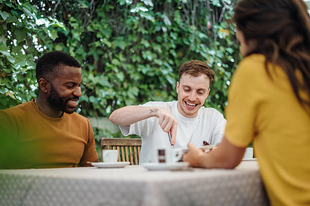 istock Friends eating lunch at a restaurant 2220464329