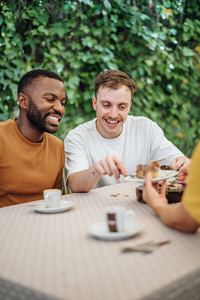 istock Friends eating lunch at a restaurant 2220464331