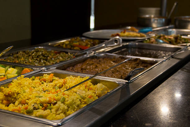 An inviting buffet offering a colorful array of dishes, showcasing a harmonious blend of textures and flavors ideal for any gathering or event.