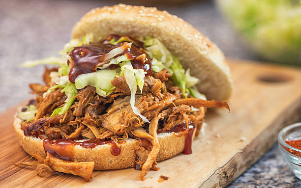 istock Homemade Pulled Pork Sandwich with Coleslaw and Barbecue Sauce 2220467523