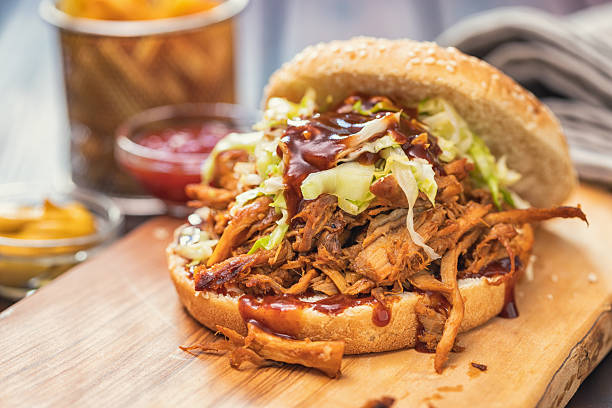 istock Homemade Pulled Pork Sandwich with Coleslaw and Barbecue Sauce 2220467635