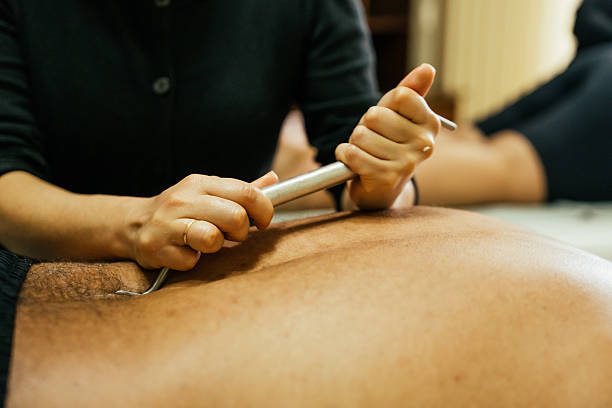 Female physical therapist warming up before massage