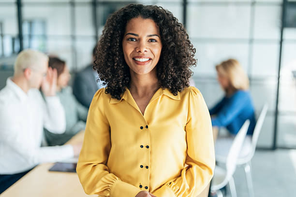 istock Confident Businesswoman in a Bright Office 2220473493