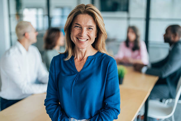 istock Confident Businesswoman in a Bright Office 2220473504