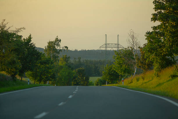Details of asphalt and nature on intercity road, spring day.