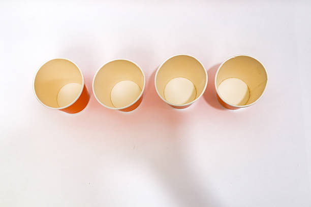 Disposable paper molds, different colors, for baking cupcakes.