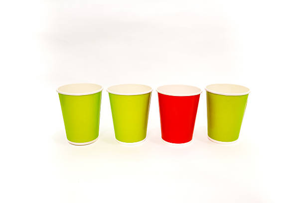 istock Colorful paper cups on white background, vibrant single use disposable cups row, perfect for party supplies or coffee 2220481305