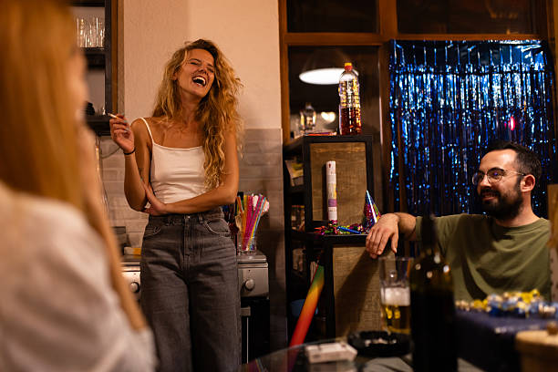 istock Friends enjoying a lively indoor celebration with laughter and activities 2220483327
